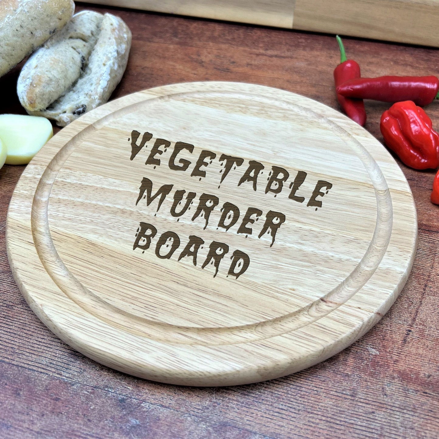 a cutting board with vegetables on top of it