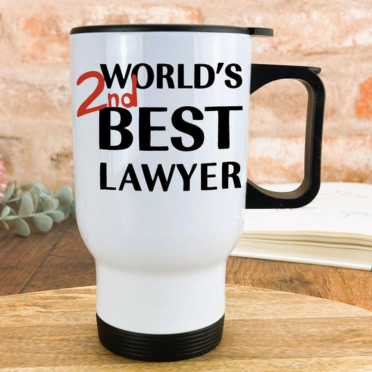 A white travel mug with black text that says "WORLD'S 2ND BEST LAWYER" printed on it.