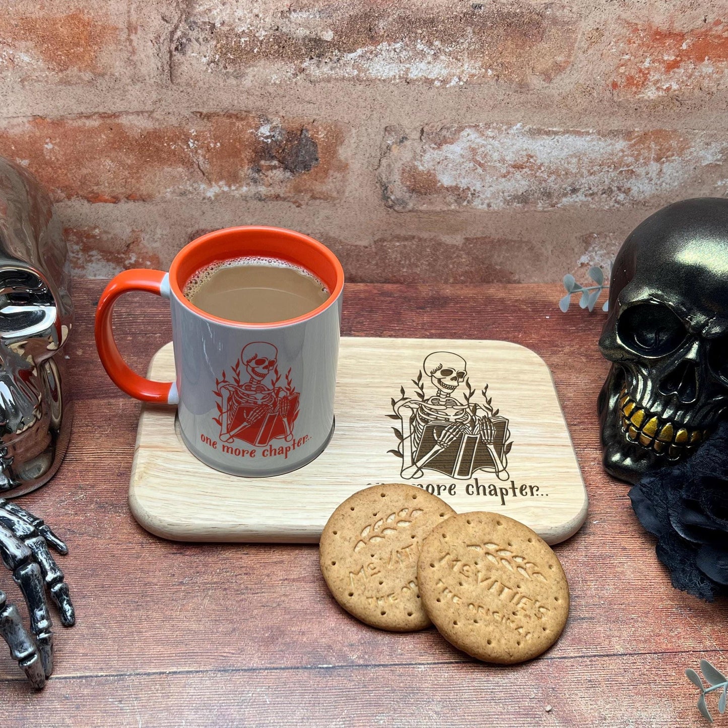 a cup of coffee and some cookies on a tray