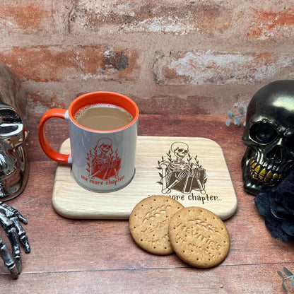 a cup of coffee and some cookies on a tray