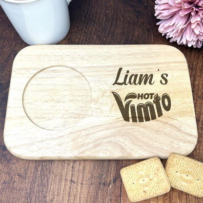a wooden coaster sitting on top of a wooden table