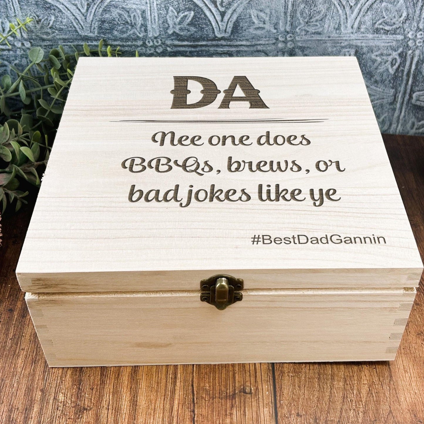 a wooden box sitting on top of a wooden table