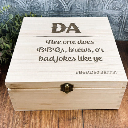 a wooden box sitting on top of a wooden table