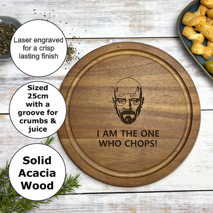 a wooden cutting board with a picture of a man's face on it