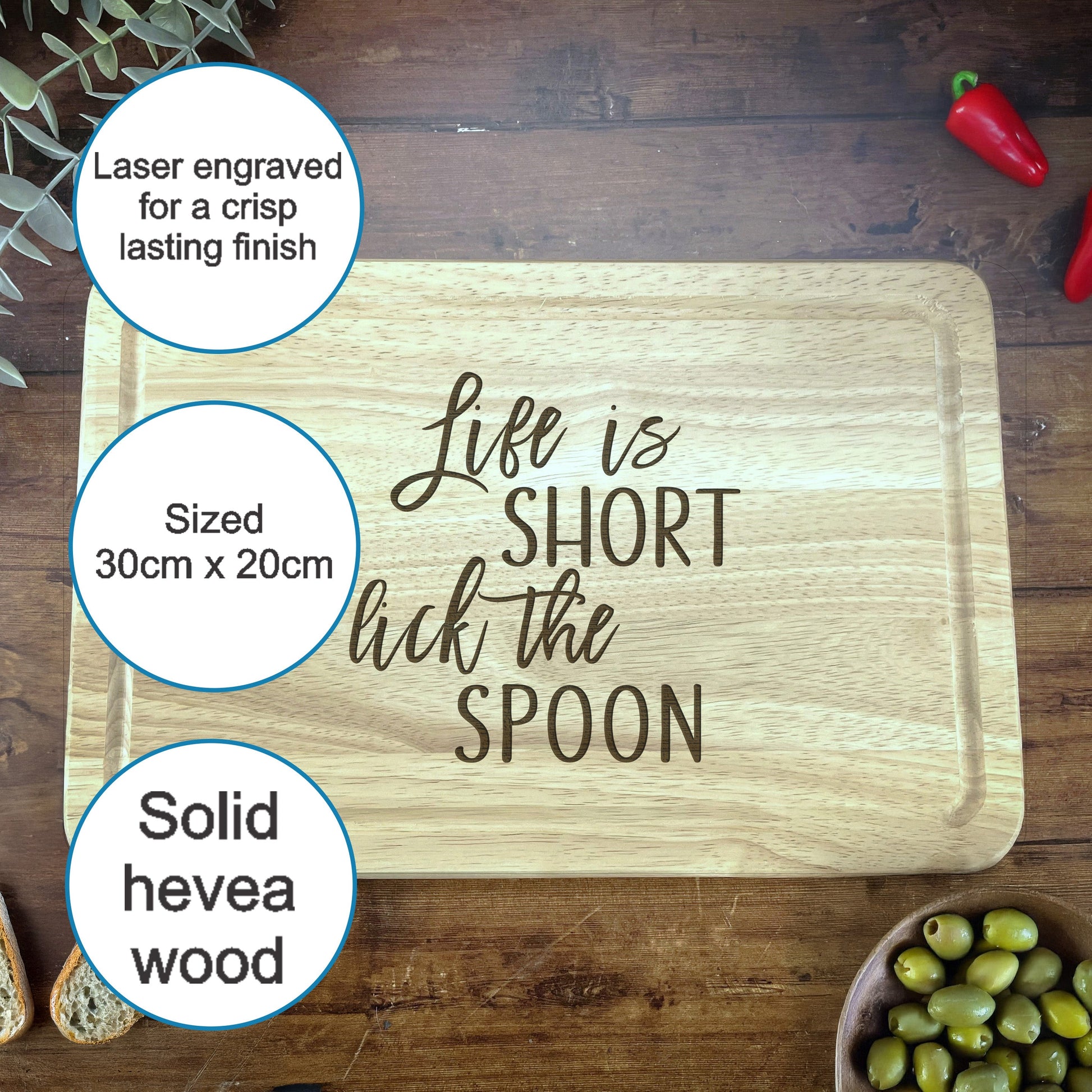 a wooden cutting board with a quote on it