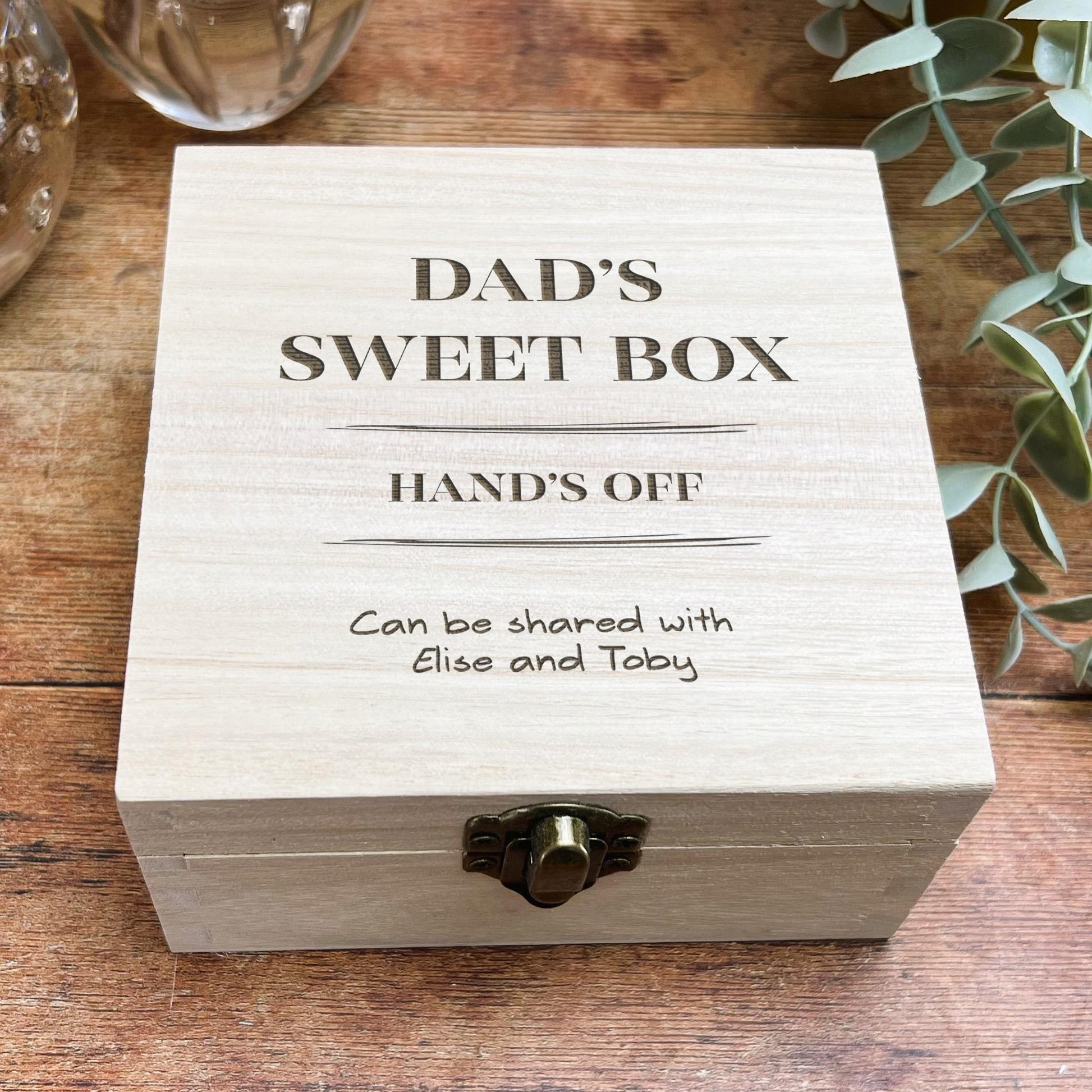 a wooden box that says dad's sweet box hands off can be shared with