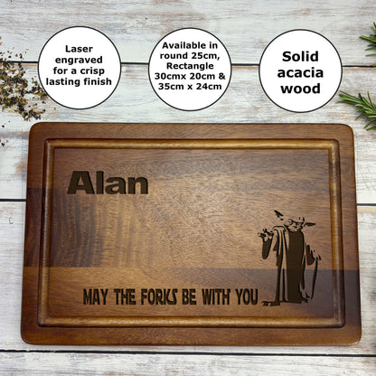a wooden cutting board with a picture of a wizard on it