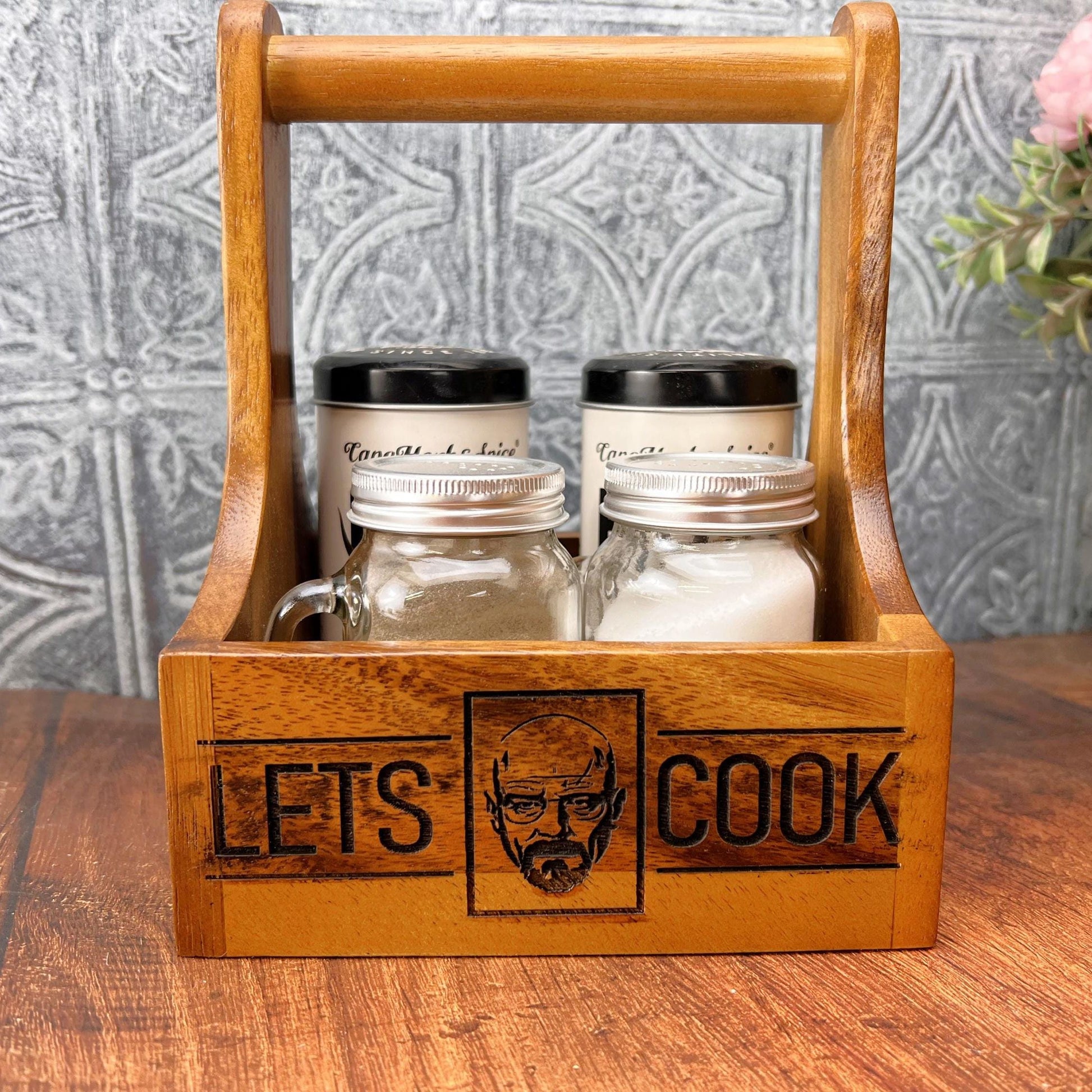 a wooden box with a beer and a grater