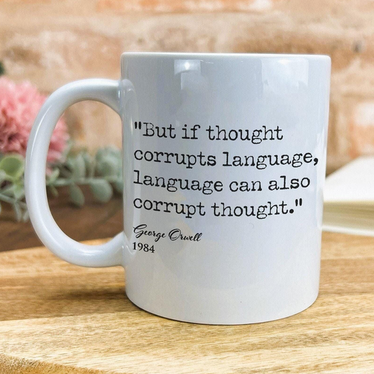 a white coffee mug with a quote on it
