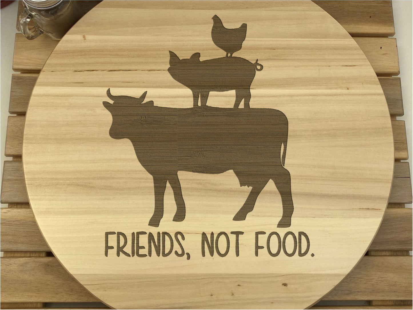 a wooden sign that says friends, not food