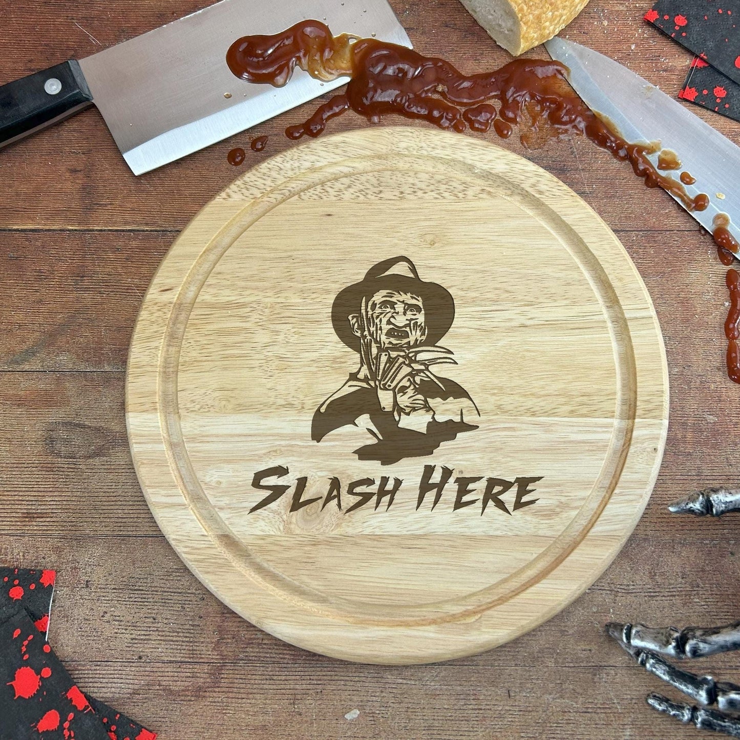 a wooden cutting board with a picture of a skeleton on it