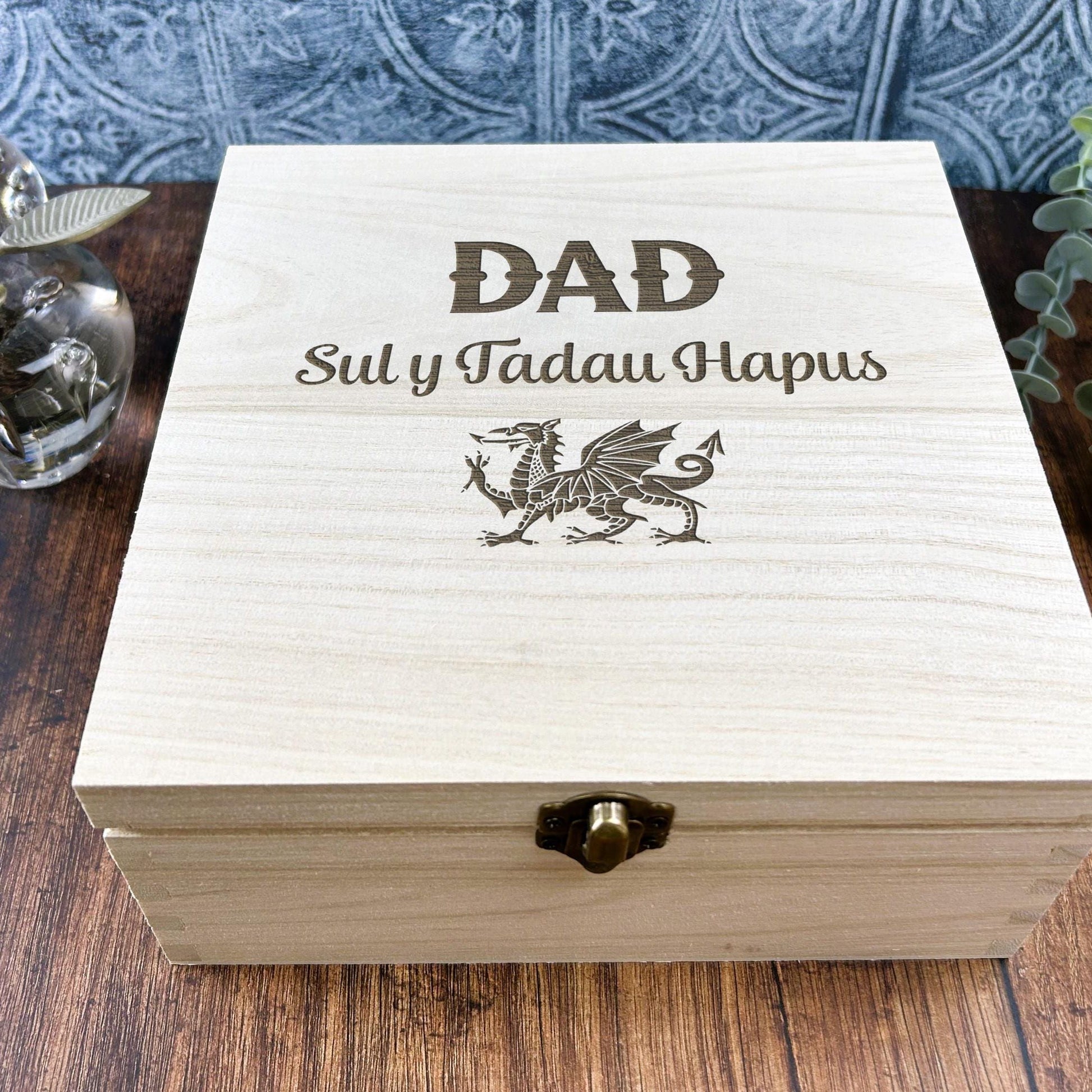 a wooden box sitting on top of a wooden table