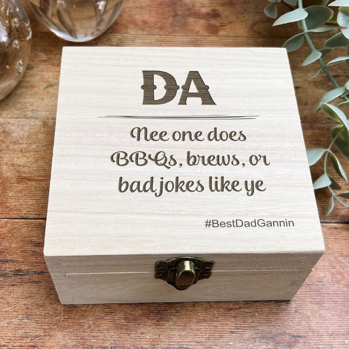 a wooden box with a quote on it