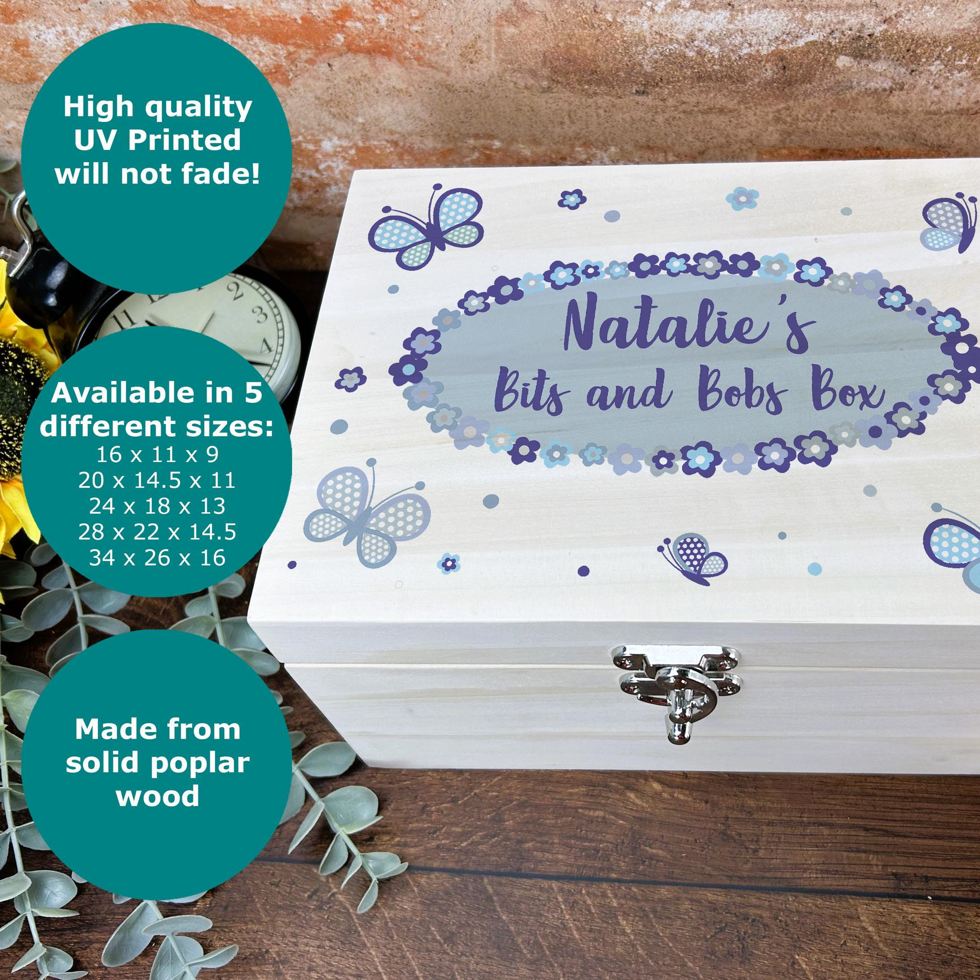 a wooden box with a picture of a butterfly on it