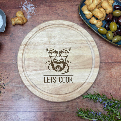 a wooden cutting board with a picture of a man's face on it