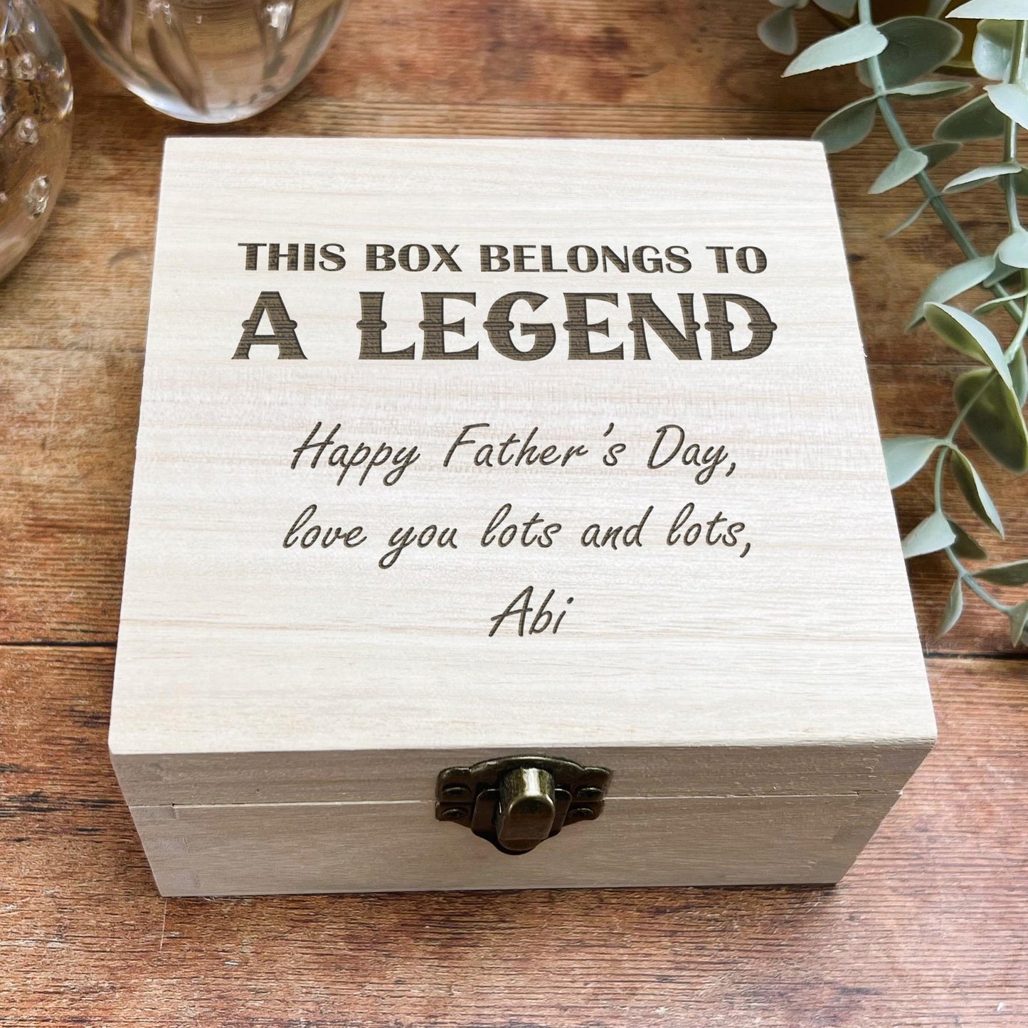 a wooden box with a message on it