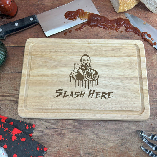 a wooden cutting board with a picture of a man on it