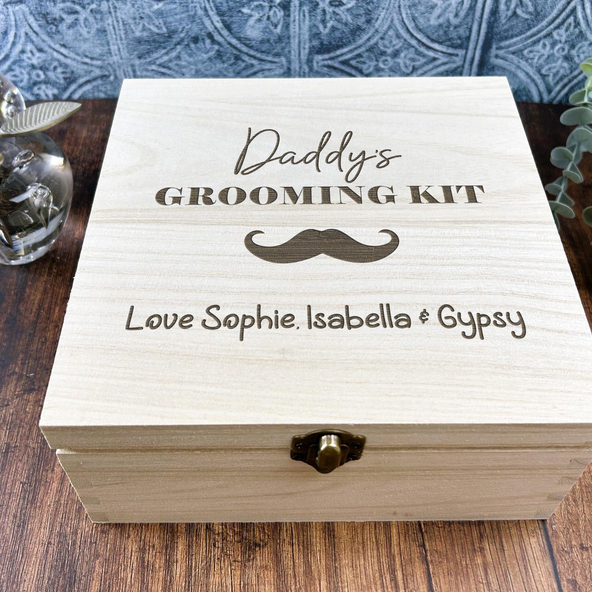 a wooden box sitting on top of a wooden table