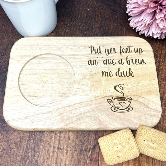 a wooden coaster with a picture of a cup of coffee