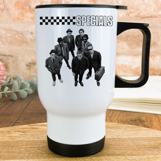 A white travel mug with a black handle and a black and white image of a group of men in suits, along with the text "SPECIALS" printed on it.