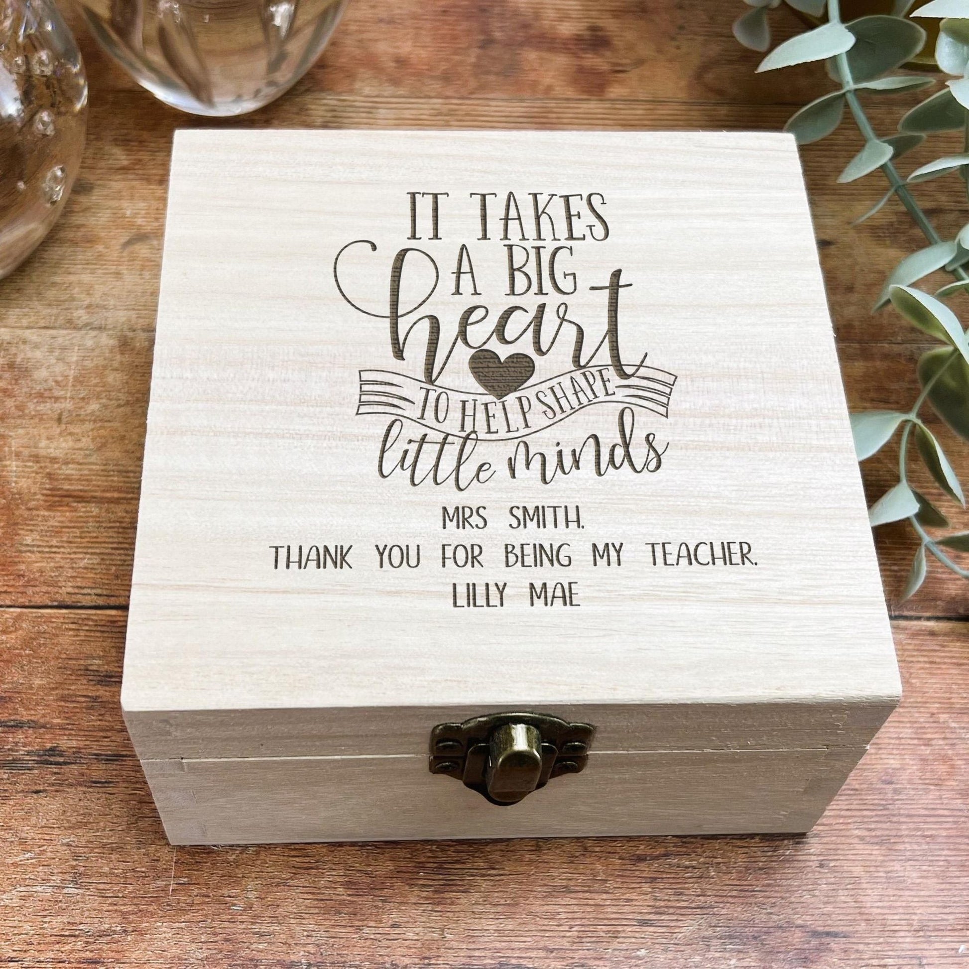 a wooden box with a quote on it