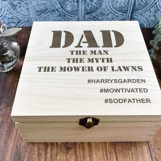 a wooden box sitting on top of a wooden table