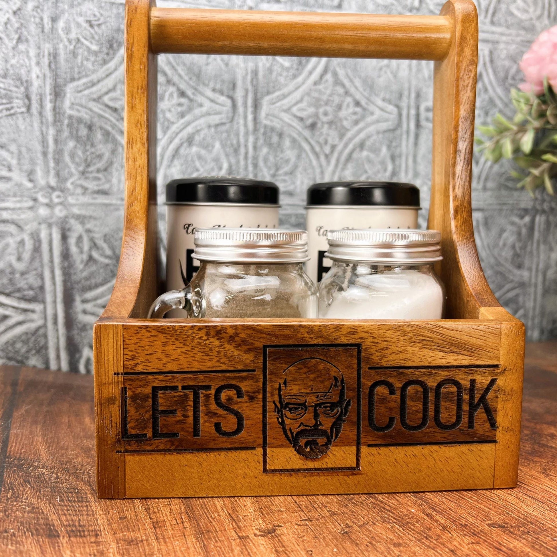 a wooden box filled with jars and a wooden handle