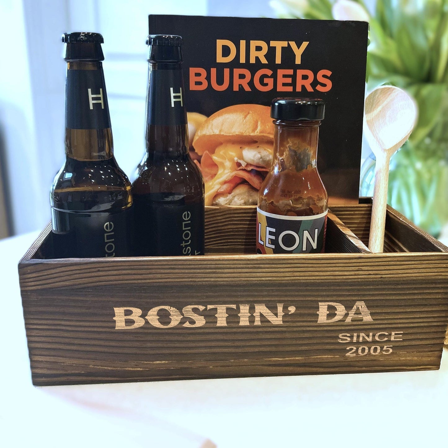 a wooden box filled with bottles of beer