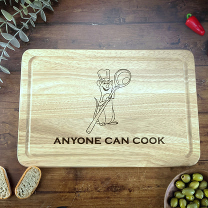 a wooden cutting board with a cartoon character on it
