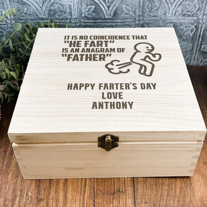 a wooden box sitting on top of a wooden table