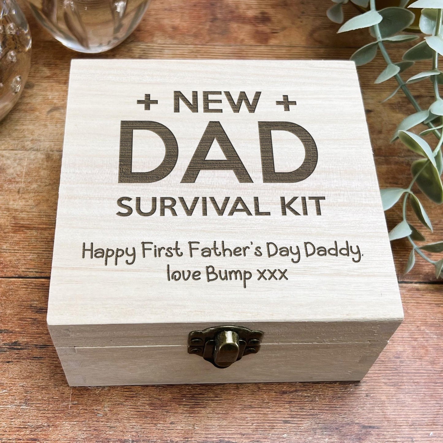 a wooden box with the words new dad on it