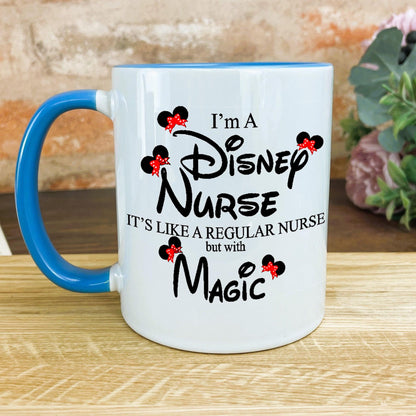 a blue and white coffee mug sitting on top of a wooden table