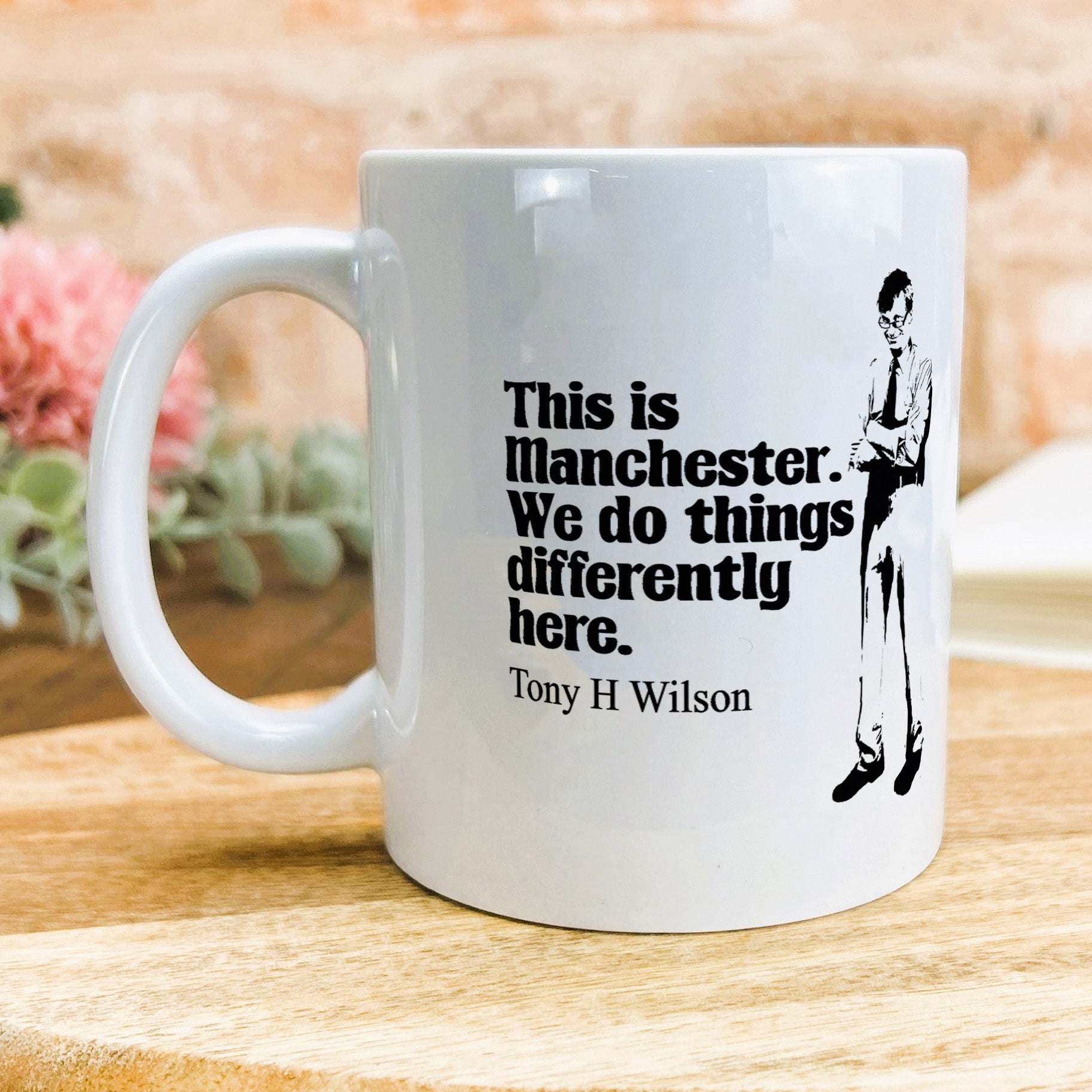 a white coffee mug with a quote on it
