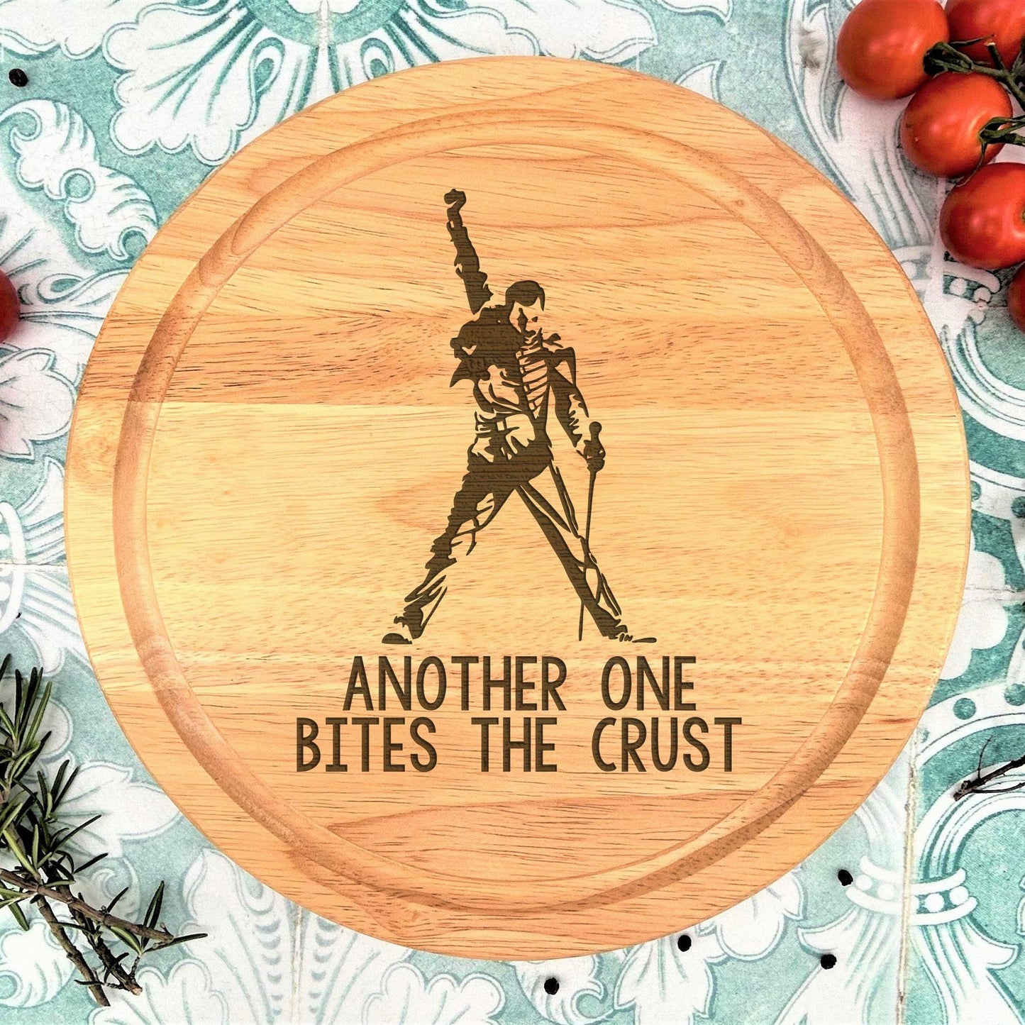 a cutting board with the words another one bites the crust on it