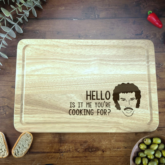 a cutting board with a picture of a man on it