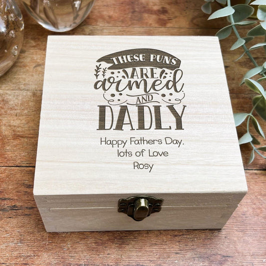 a wooden box sitting on top of a wooden table