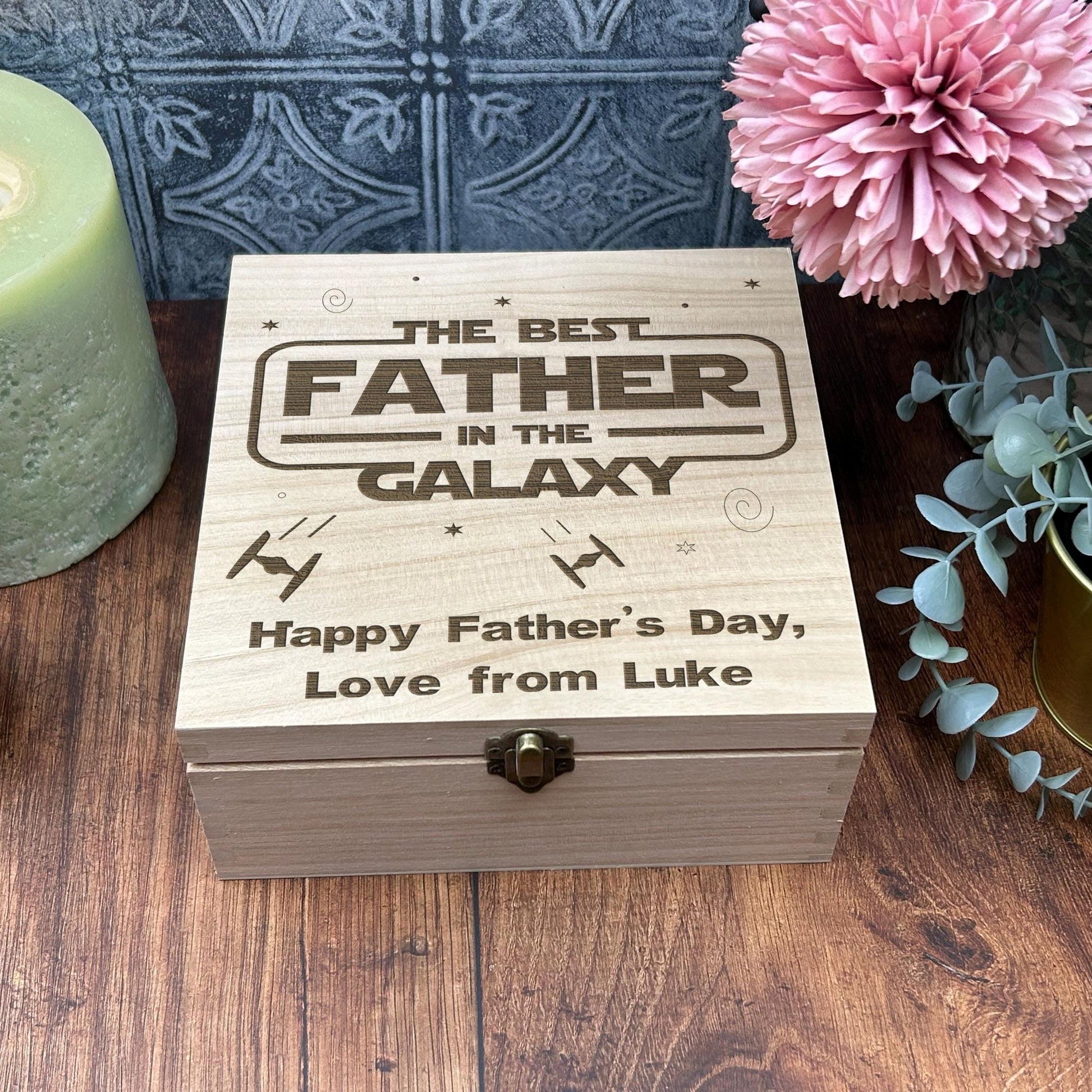 a wooden box sitting on top of a wooden table