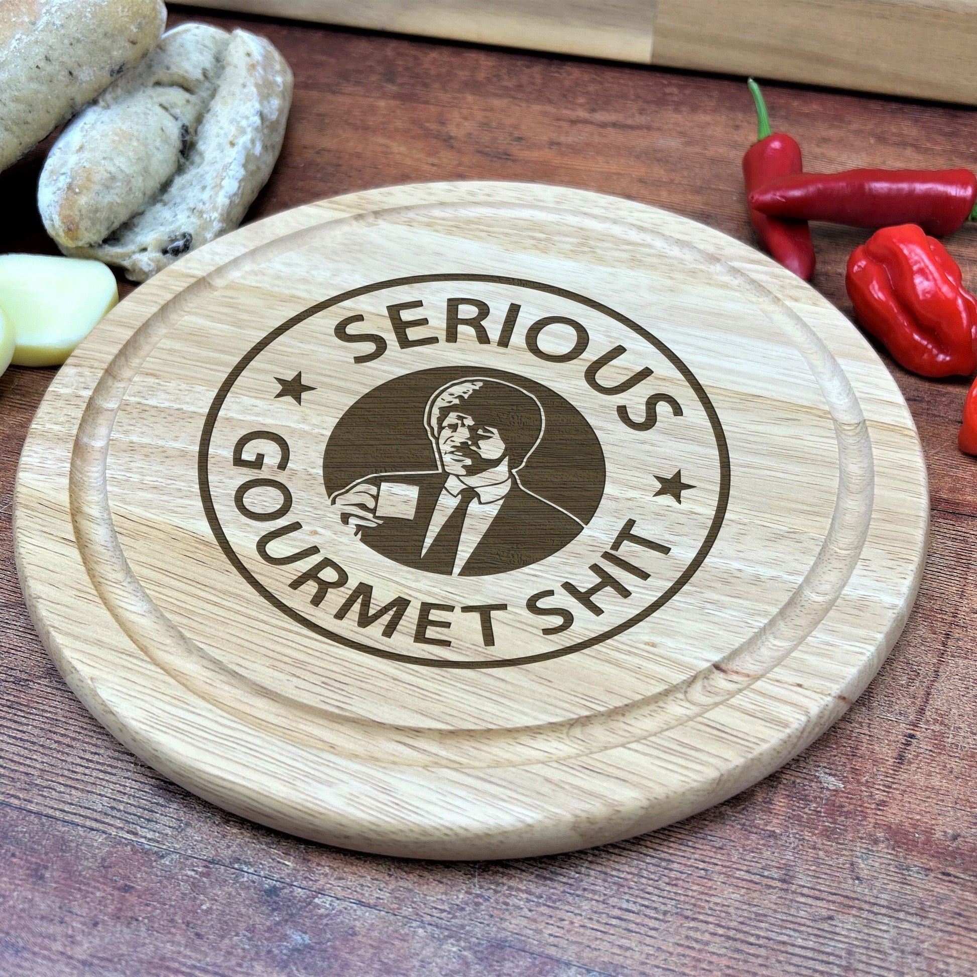 a wooden cutting board sitting on top of a wooden table