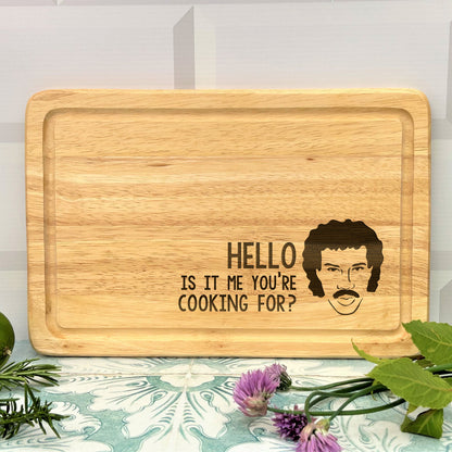 a cutting board with a picture of a man on it