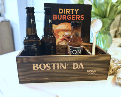 a wooden box filled with bottles of beer