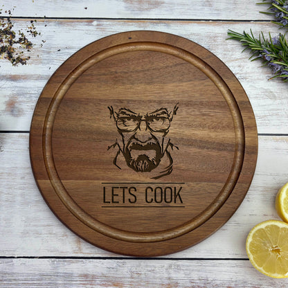 a wooden cutting board with a picture of a bearded man on it
