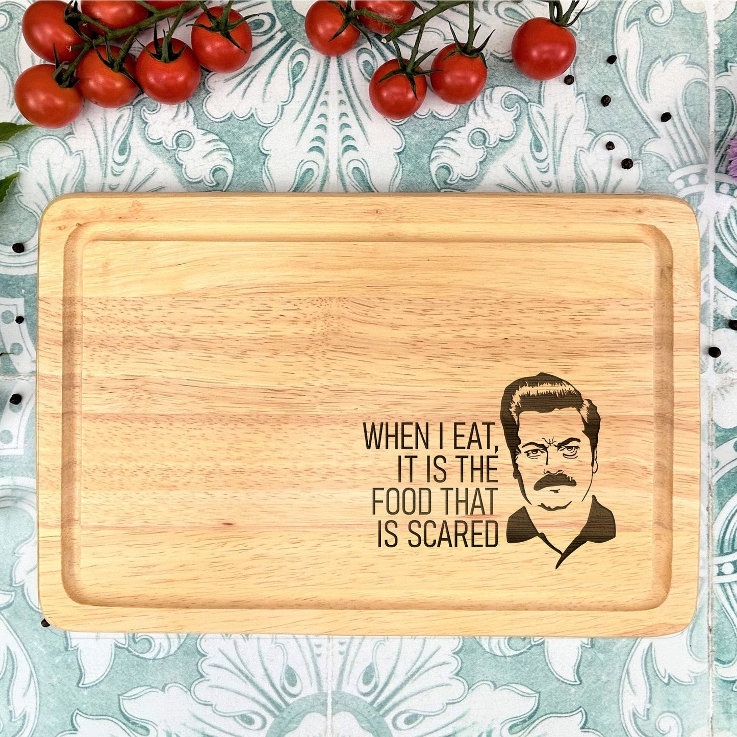 a cutting board with a picture of a man on it