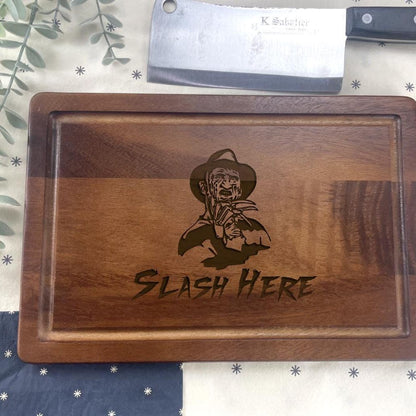 a wooden cutting board with a picture of a skeleton on it