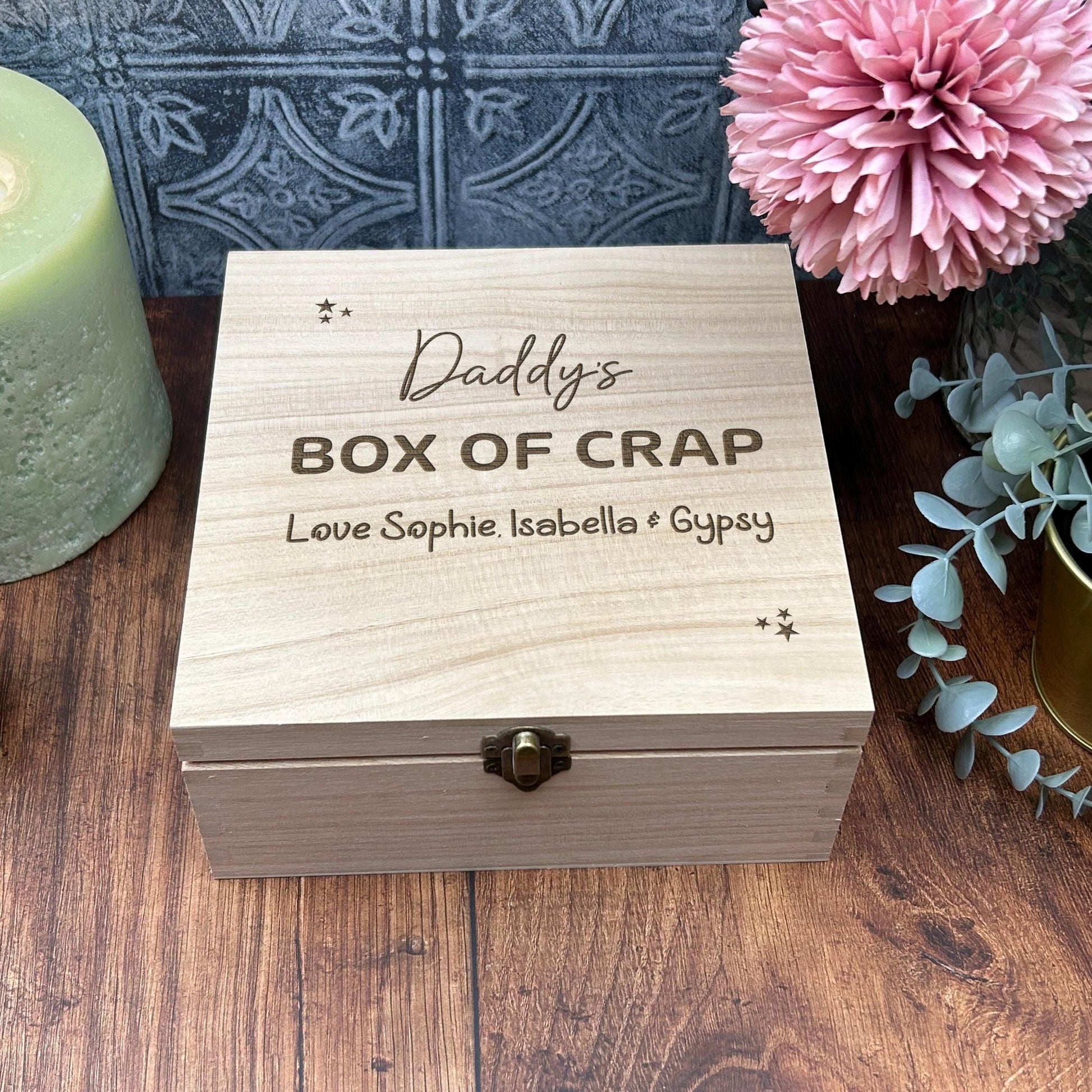 a wooden box with the words daddy's box of crap on it