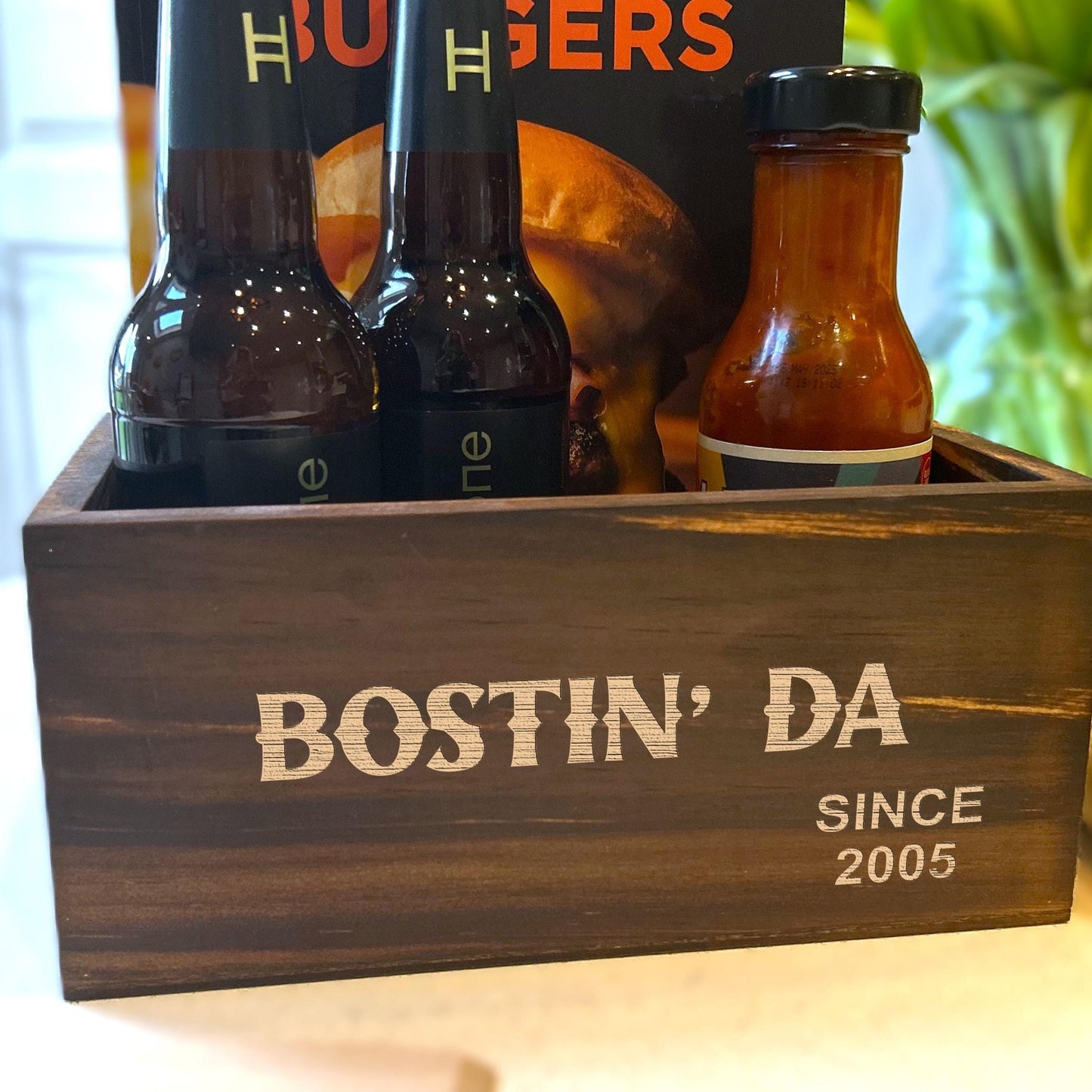 a wooden box filled with bottles of beer
