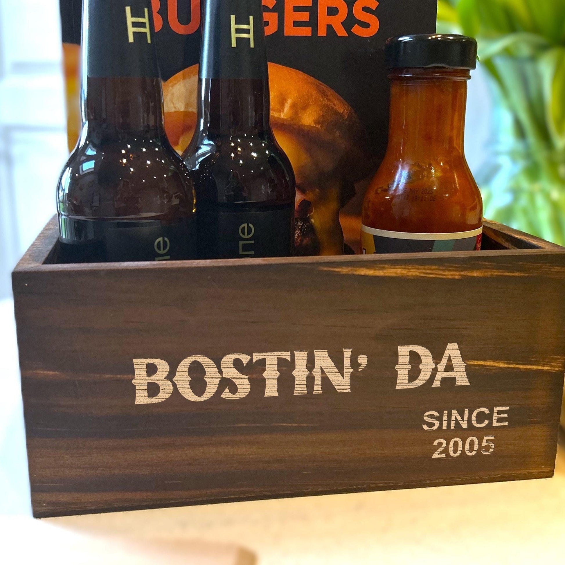 a wooden box filled with bottles of beer