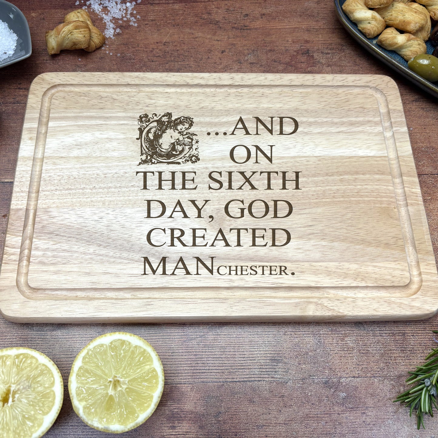 And On The Sixth Day God Created MANchester - Engraved Wooden Chopping Board