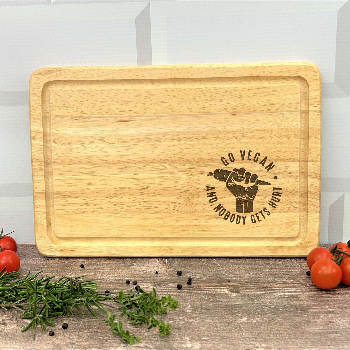 a wooden cutting board with a logo on it