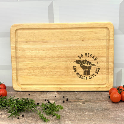 a wooden cutting board with a logo on it
