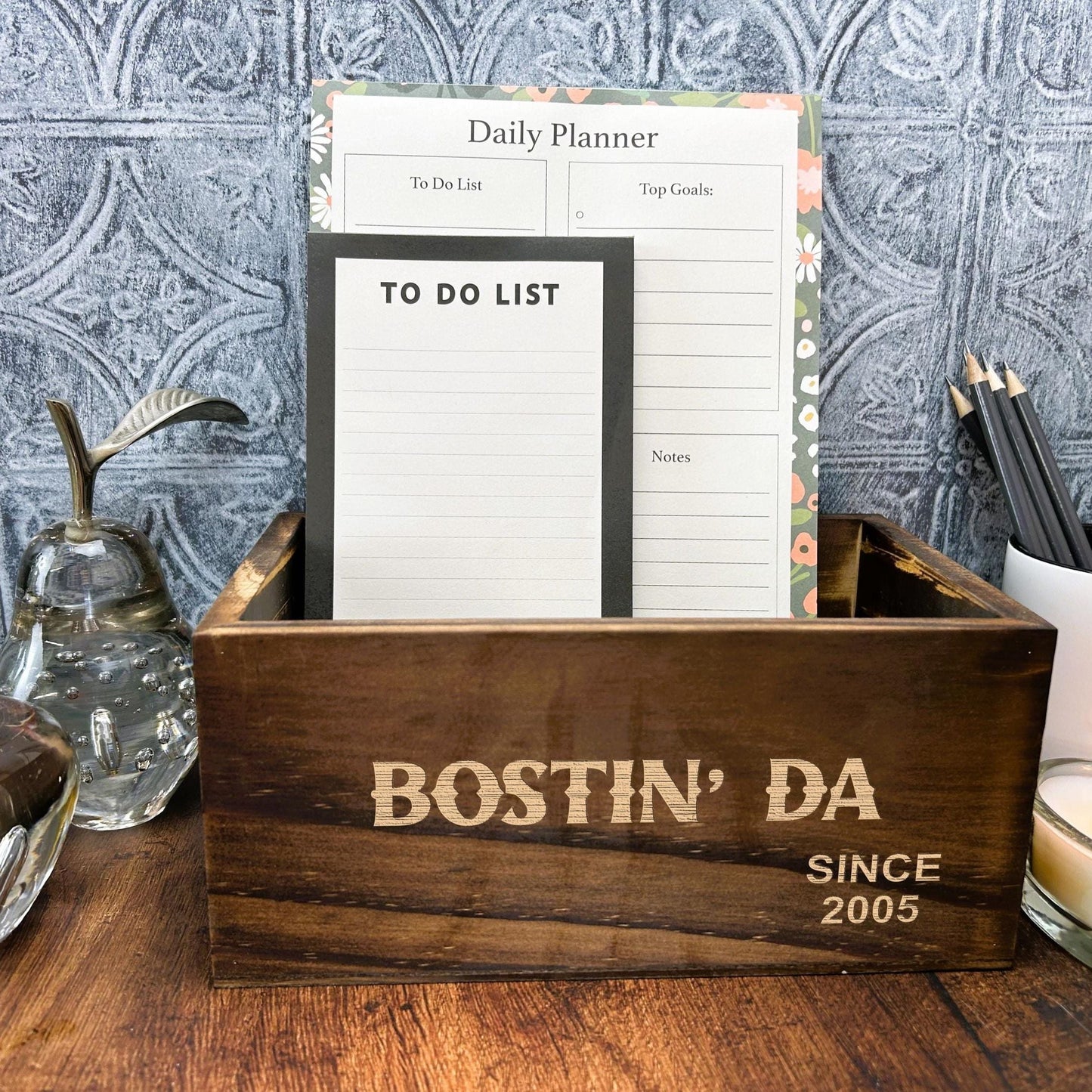 a wooden box sitting on top of a wooden table